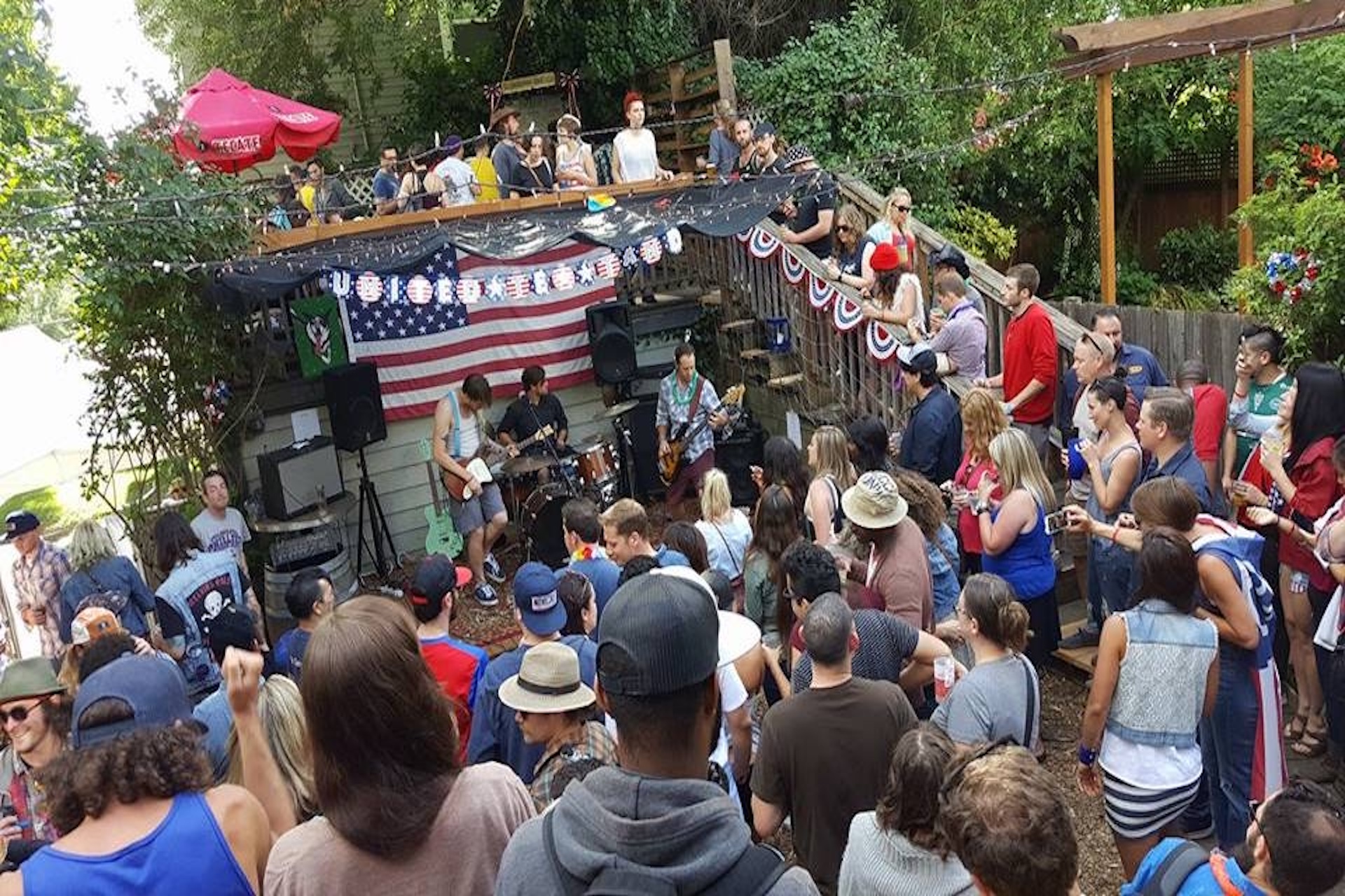 Walking Stalking Robots (Tarl Heddleston , Paul Hubbard and Scott Warner) playing for a big croud on the US holiday Indenpence Day, or the Fourth of July.