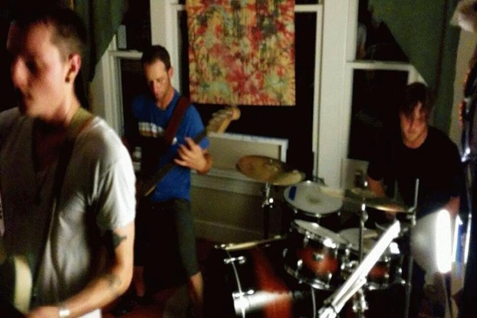 Walking Stalking Robots (Tarl Heddleston , Paul Hubbard and Scott Warner) playing for a house show in Portland, OR.